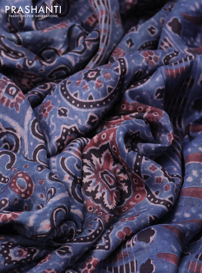 Printed silk saree blue and black with allover ajrakh prints and simple border