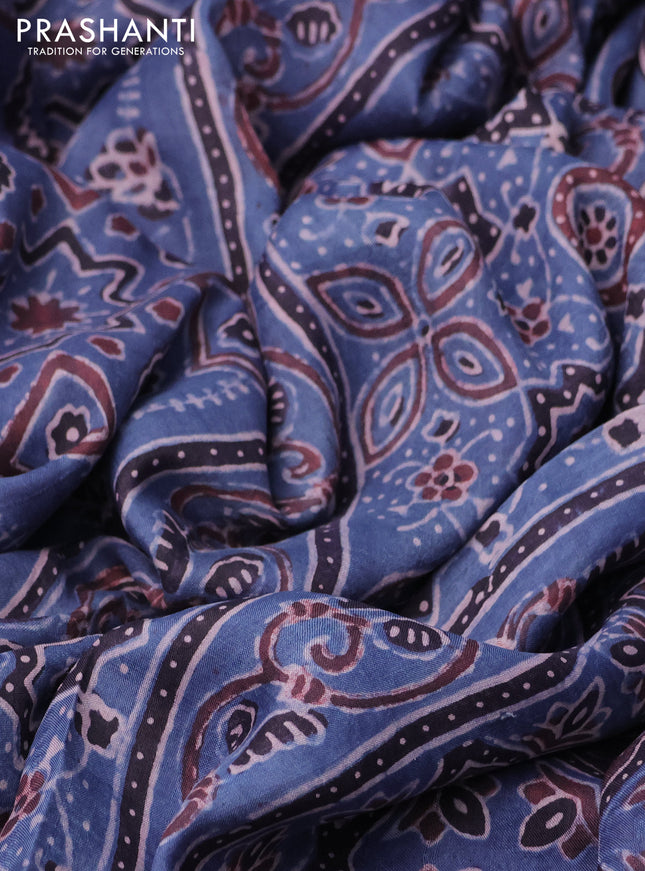 Printed silk saree blue and coffee brown with allover ajrakh prints and simple border