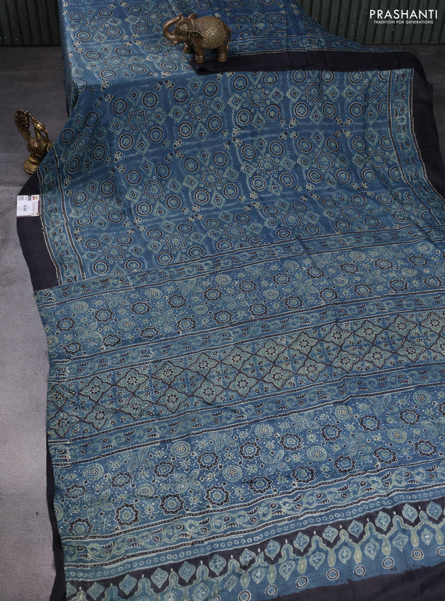 Printed silk saree blue and black with allover ajrakh prints and simple border