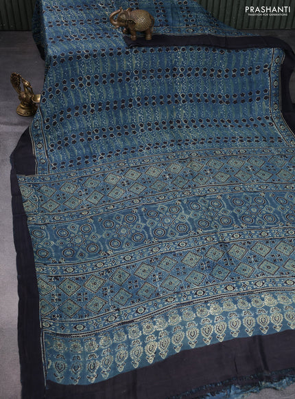 Printed silk saree blue and black with allover ajrakh prints and simple border