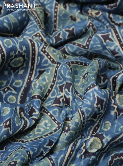 Printed silk saree blue and black with allover ajrakh prints and simple border