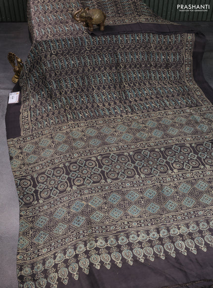 Printed silk saree grey shade with allover ajrakh prints and simple border