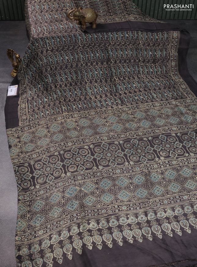 Printed silk saree grey shade with allover ajrakh prints and simple border