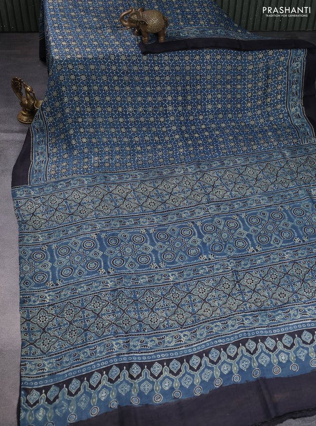 Printed silk saree blue and black with allover ajrakh prints and simple border