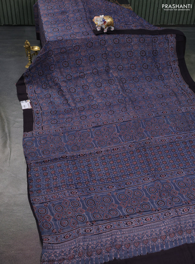 Printed silk saree bluish grey and black with allover ajrakh prints and simple border