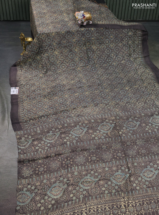 Printed silk saree pastel blue and grey with allover ajrakh prints and simple border