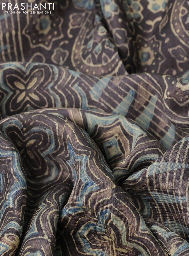 Printed silk saree pastel blue and grey with allover ajrakh prints and simple border