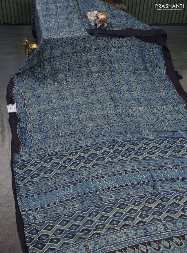 Printed silk saree blue and black with allover ajrakh prints and simple border