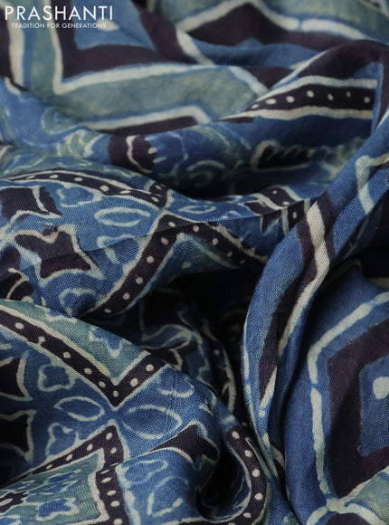 Printed silk saree blue and black with allover ajrakh prints and simple border