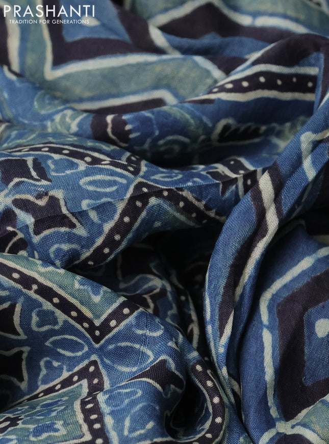 Printed silk saree blue and black with allover ajrakh prints and simple border
