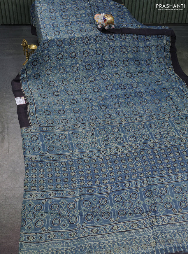 Printed silk saree blue and black with allover ajrakh prints and simple border
