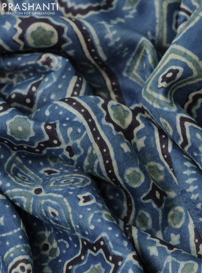 Printed silk saree blue and black with allover ajrakh prints and simple border