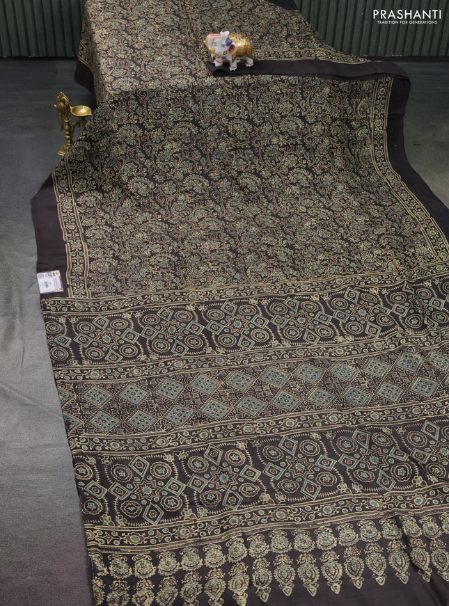 Printed silk saree grey shade and blue with allover ajrakh prints and simple border