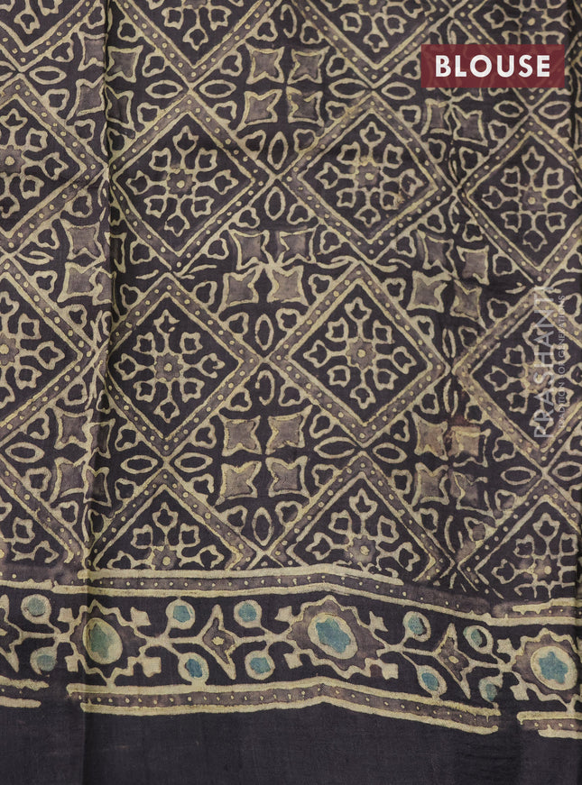 Printed silk saree grey shade and blue with allover ajrakh prints and simple border