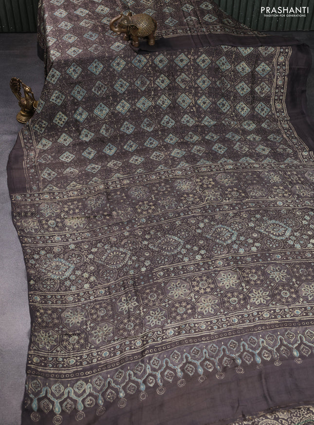 Printed silk saree grey shade with allover ajrakh prints and simple border