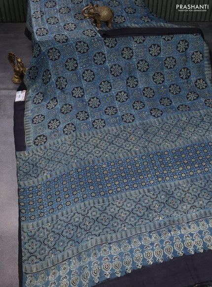Printed silk saree blue and black with allover ajrakh prints and simple border