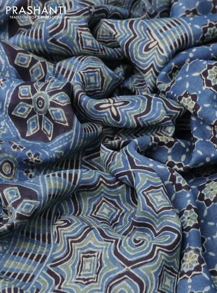 Printed silk saree blue and black with allover ajrakh prints and simple border