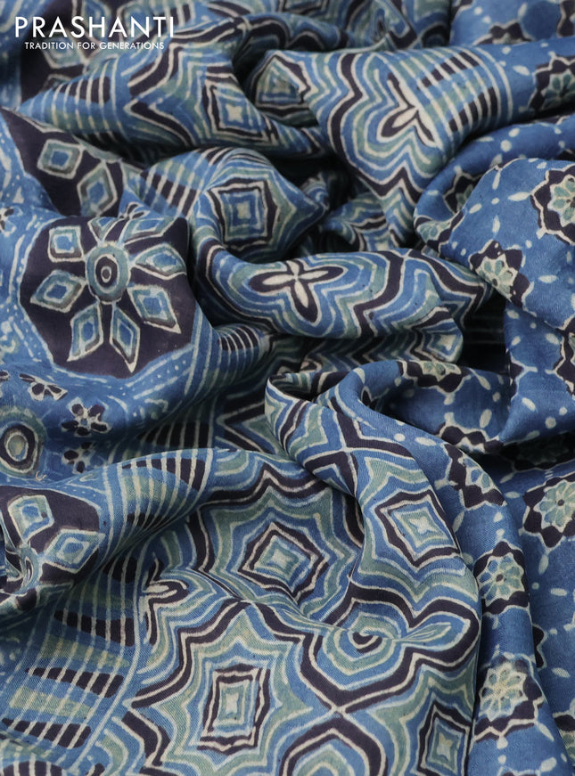 Printed silk saree blue and black with allover ajrakh prints and simple border