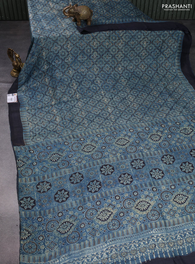 Printed silk saree blue and black with allover ajrakh prints and simple border