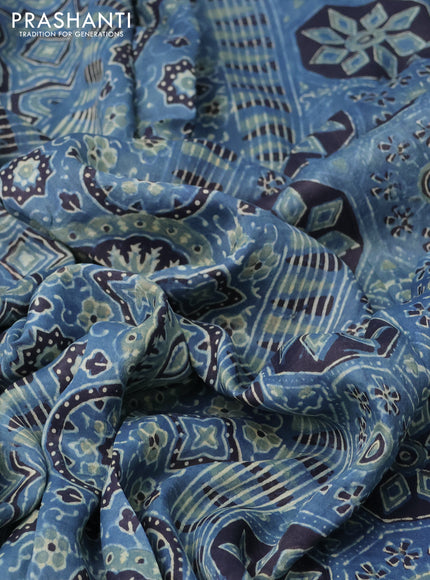 Printed silk saree blue and black with allover ajrakh prints and simple border