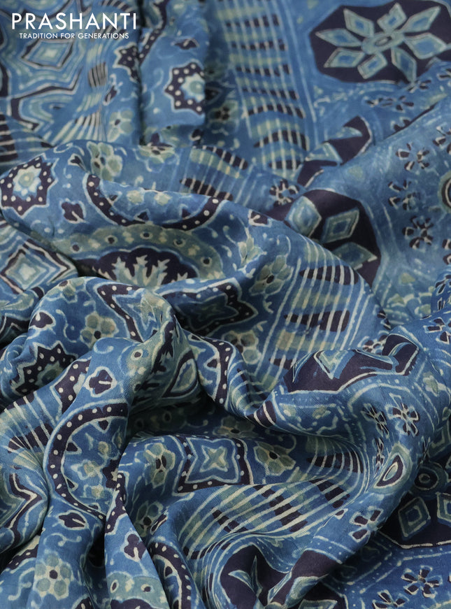 Printed silk saree blue and black with allover ajrakh prints and simple border