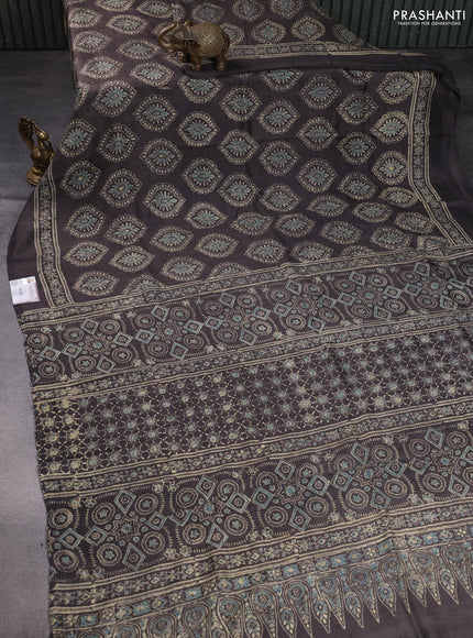 Printed silk saree grey shade with allover ajrakh prints and simple border