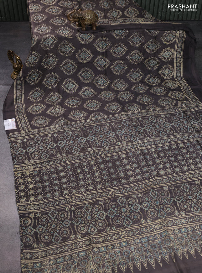 Printed silk saree grey shade with allover ajrakh prints and simple border
