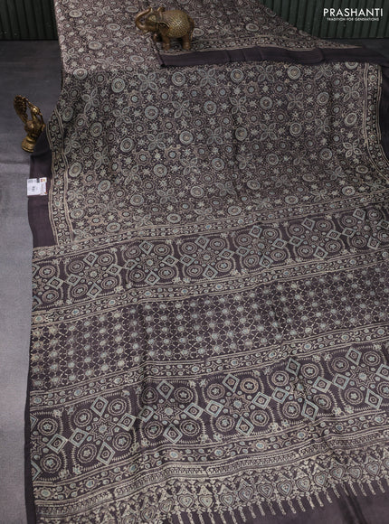 Printed silk saree grey shade with allover ajrakh prints and simple border