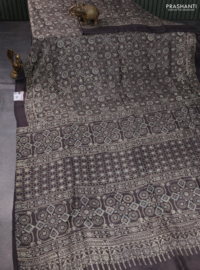 Printed silk saree grey shade with allover ajrakh prints and simple border