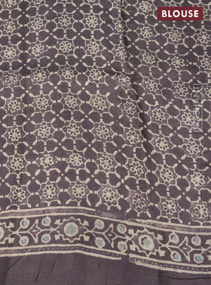 Printed silk saree grey shade with allover ajrakh prints and simple border