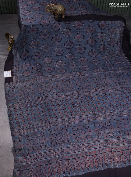 Printed silk saree bluish grey and deep jamun with allover ajrakh prints and simple border