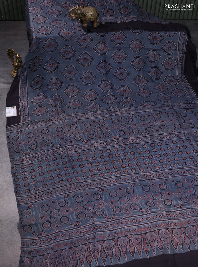 Printed silk saree bluish grey and deep jamun with allover ajrakh prints and simple border
