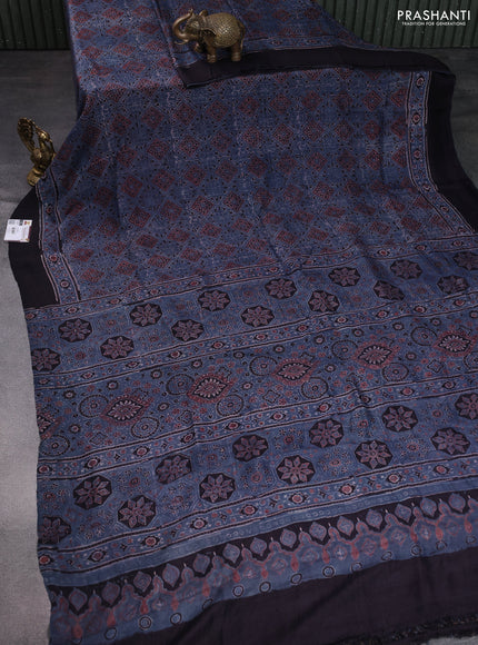 Printed silk saree blue and black with allover ajrakh prints and simple border