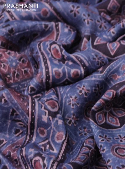 Printed silk saree blue and black with allover ajrakh prints and simple border