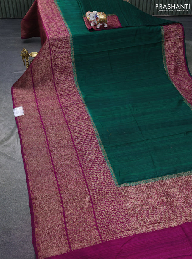 Banarasi raw silk saree green and dark magenta with plain body and long zari woven border