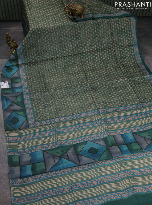 Pure tussar silk saree green shade with allover digital prints and long printed border