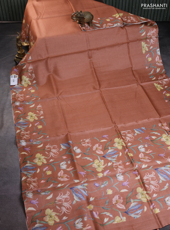 Pure tussar silk saree rust shade with allover zari weaves and floral digital printed border