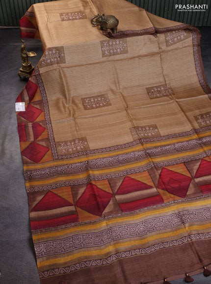 Pure tussar silk saree sandal and multi colour with butta prints and printed border