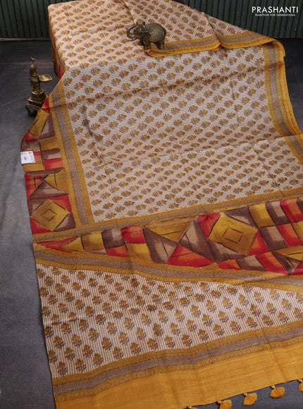 Pure tussar silk saree beige and multi colour with floral butta prints and printed border