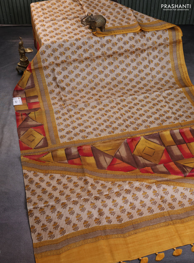 Pure tussar silk saree beige and multi colour with floral butta prints and printed border