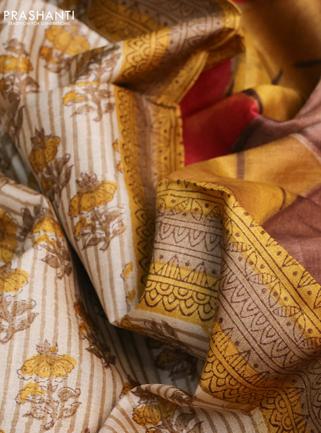 Pure tussar silk saree beige and multi colour with floral butta prints and printed border