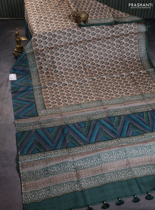 Pure tussar silk saree sandal and multi colour with floral butta prints and printed border