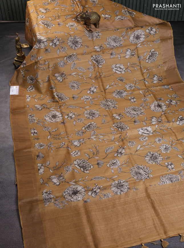 Pure tussar silk saree mustard shade with floral digital prints and zari woven border