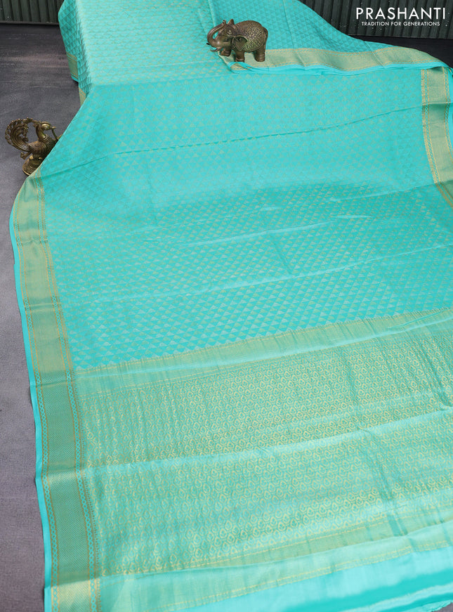 Pure mysore silk saree teal green with allover geometric zari weaves and zari woven border