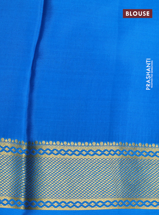 Pure mysore silk saree pink and cs blue with allover geometric zari weaves and zari woven border