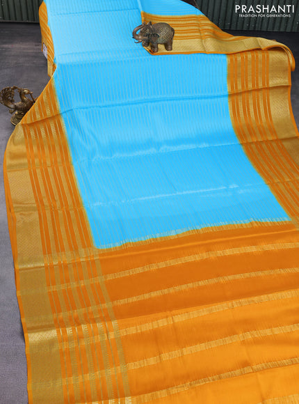 Pure mysore silk saree light blue and mustard yellow with allover zari stripes pattern and long zari woven border