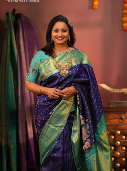 Pure kanchipuram silk saree blue and dual shade of teal blue with allover butta prints and floral embroidery cut work zari border