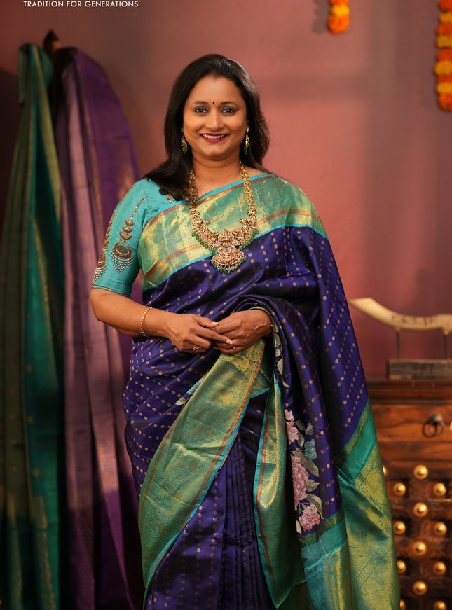 Pure kanchipuram silk saree blue and dual shade of teal blue with allover butta prints and floral embroidery cut work zari border