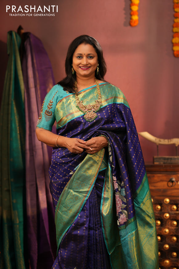 Pure kanchipuram silk saree blue and dual shade of teal blue with allover butta prints and floral embroidery cut work zari border