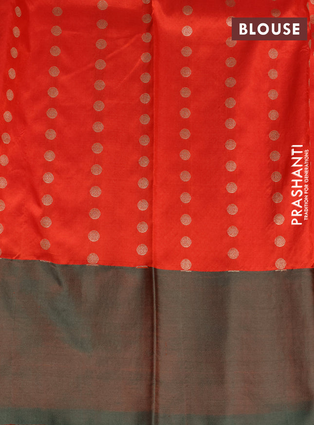 Banarasi katan silk saree reddish orange and greyish green with zari woven floral buttas and zari woven butta border